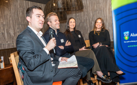 Four UCD alumni speaking at a career panel.